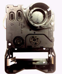 Seiko quartz clock movement with chime. Showing switches on back